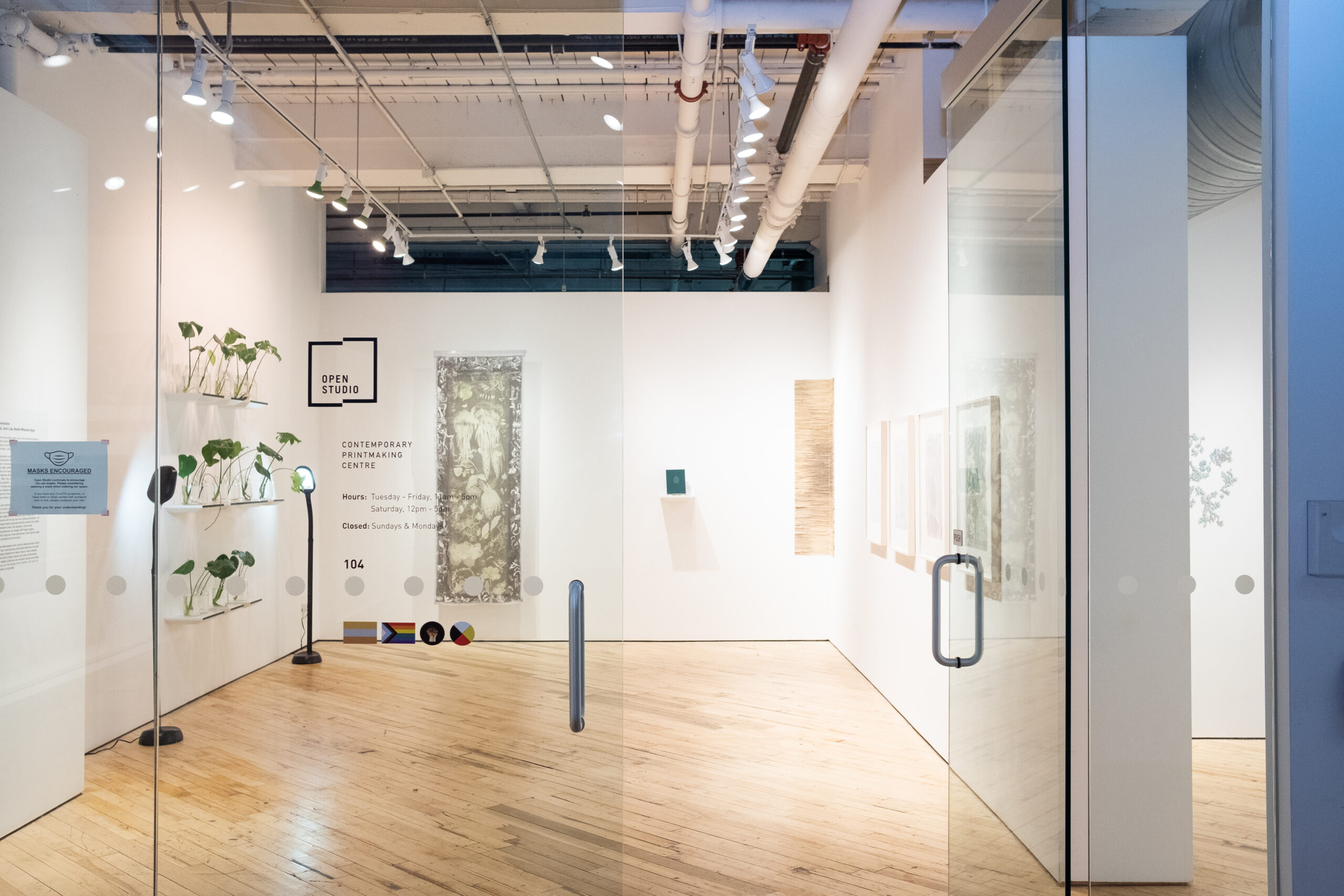 Image: Installation view of group exhibit Cultivating Connection at Open Studio, featuring artwork by Alyssa Alikpala, Noelle Wharton-Ayer, and Jenn Law