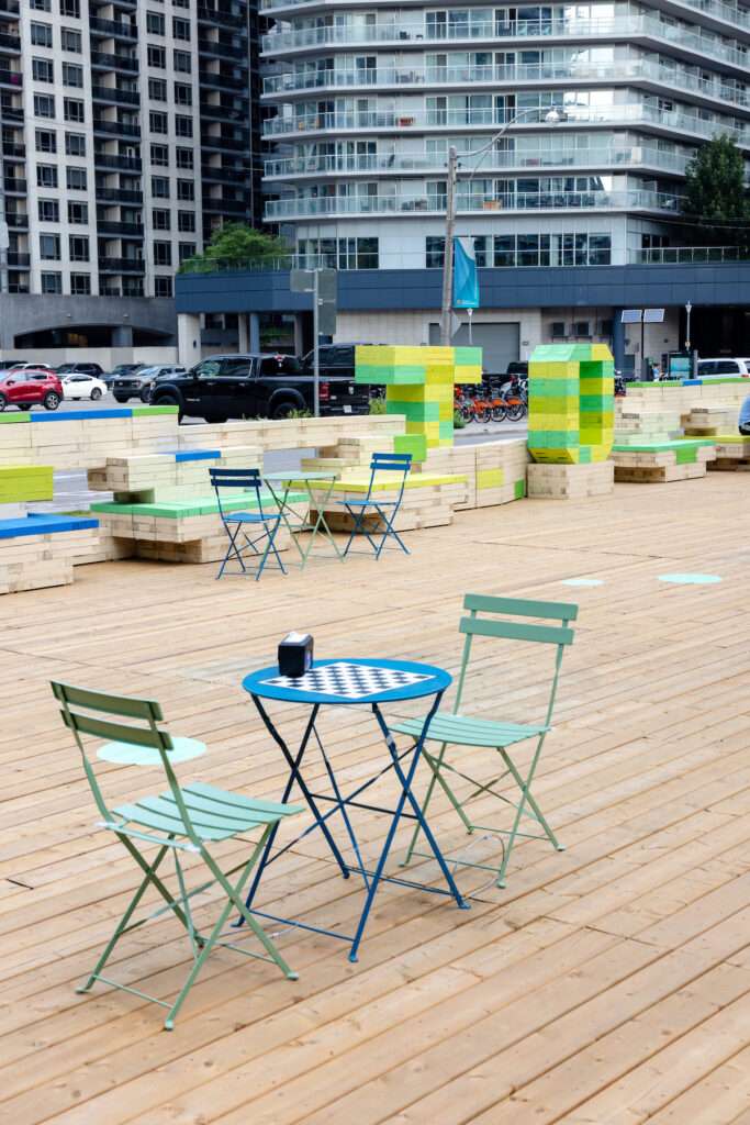 Seating and photo-friendly backdrop in Clarence Square Park Toronto 